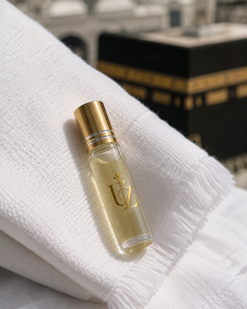 Travel attar bottle beside Ihram cloth, Hajj and Umrah fragrance guide